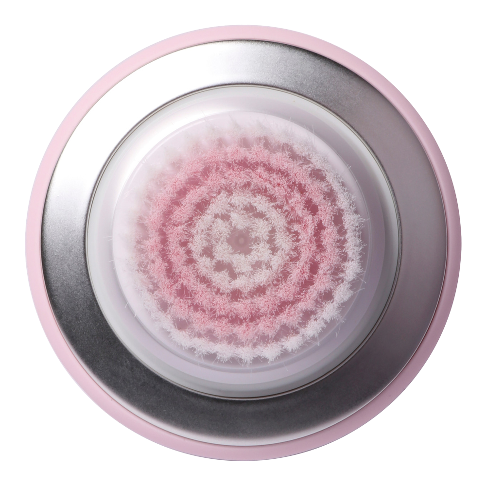 Bottom view of Manicare Sonic Mini facial brush showing waterproof base, brush texture, and ergonomic handle design