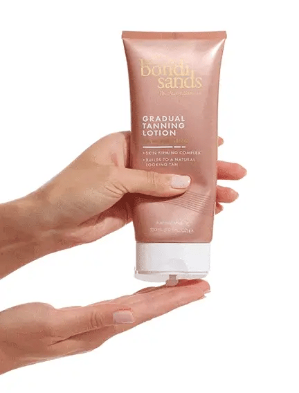Bondi Sands Gradual Tanning Lotion being pumped in animated GIF, creamy texture for skin firmness and everyday glow