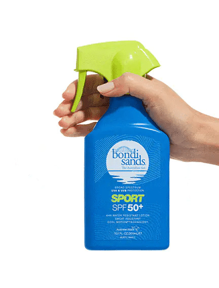 Bondi Sands Sport SPF 50+ Spray in use, showing mist and Cool Motion® Tech with sweat-resistant, lightweight sun protection