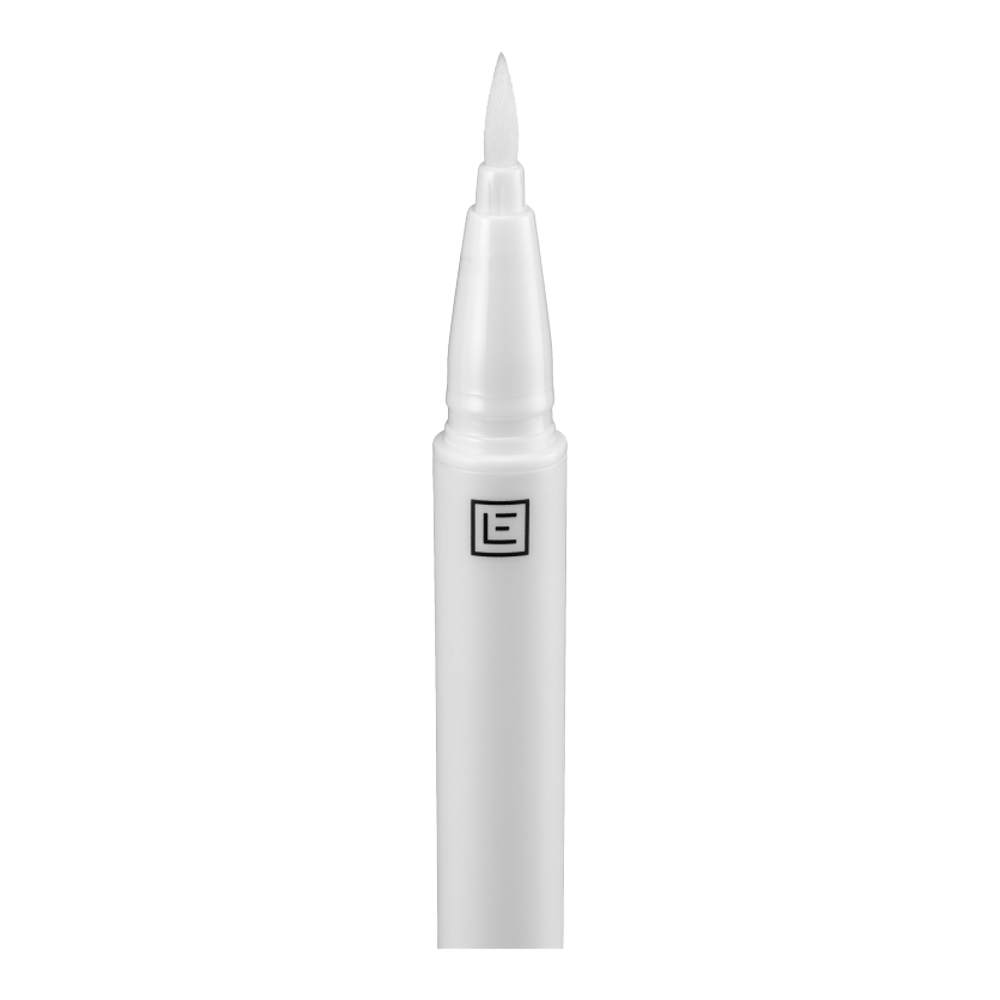 Eylure Line & Lash 2-in-1 Adhesive Eyeliner Clear applicator closeup – precision felt tip lays adhesive lash line, Blush Fiji
