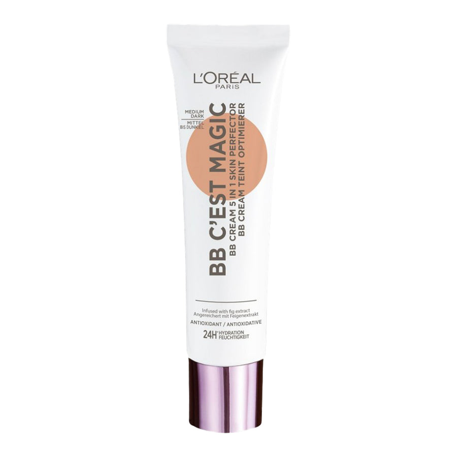 L'Oreal C'est Magic BB Cream 30ml 04 MEDIUM DARK seamlessly blending with skin, offering hydration for a glowing finish.