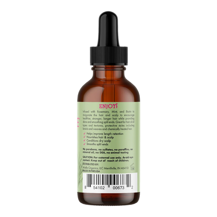 Mielle Rosemary Mint Oil bottle dispensing a drop with biotin and essential oils for scalp and hair health