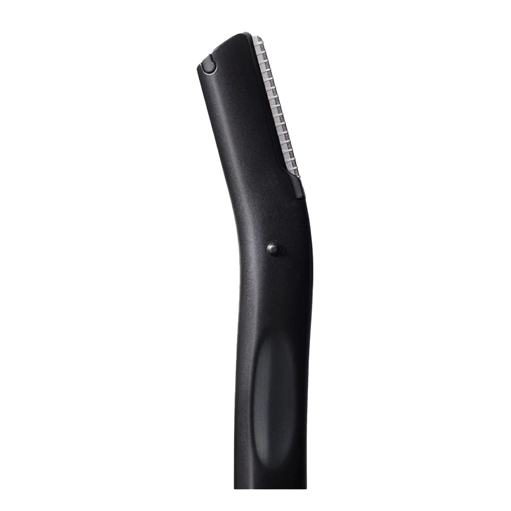 Closeup of Revlon Eyebrow Precision Shaper showing stainless steel blade, protective shield, and textured grip handle