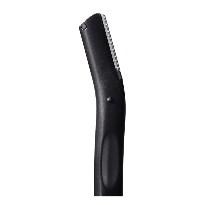 Closeup of Revlon Eyebrow Precision Shaper showing stainless steel blade, protective shield, and textured grip handle