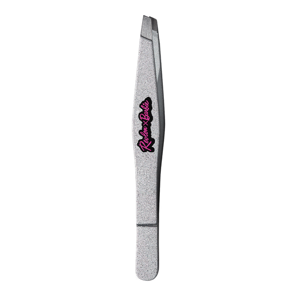 Revlon X Barbie Slant Tip Tweezer in pink with stainless steel tips for precise brow grooming and portable touch-ups